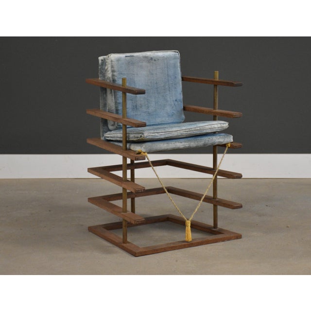 A solid oak and gold accent dining chair or lounge chair with original blue fabric. Circa 1980’s. Seat height is 20.5”....