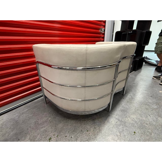 Italian design leather loveseat with chrome frame. Vintage in the style of De Pas “Onda” model made in italy