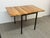 Design Plus Gallery presents the Box Frame Drop Leaf Table from West Elm. This s a space-saving dining table that can...