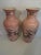 Very nice pair of large ceramic vases hand painted flowers on a pink background dating from the 1930-40s craquele glaze...