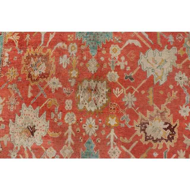 Early 20th Century Antique Turkish Oushak in Tribal Motifs in Soft Coral Blue Marigold and Cream For Sale In Atlanta - Image 6 of 13