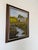 A charming 1970s vintage oil on canvas depicting a peaceful rural farm landscape with a winding river, rolling green...