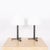 Introducing the 'Sellier' French modernist-style stitched black leather table lamps by Design Frères. Crafted from premium...