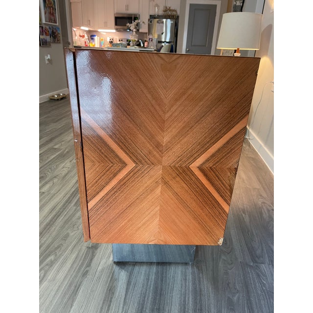 Iconic Mid-Century Modern sideboard/credenza styled after Milo Baughman for Thayer Coggin. This timeless piece features...