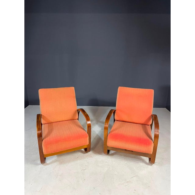 A rare pair of vintage h-70 lounge chairs up factories in brno to czech designer jindřich halabala, dating from the 1930s....