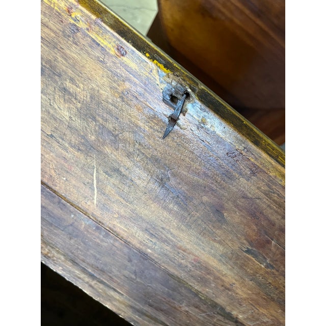 Primitive, antique blanket chest or truck. Simple lid with no hinges and very old ring pull. Interesting use of blind...