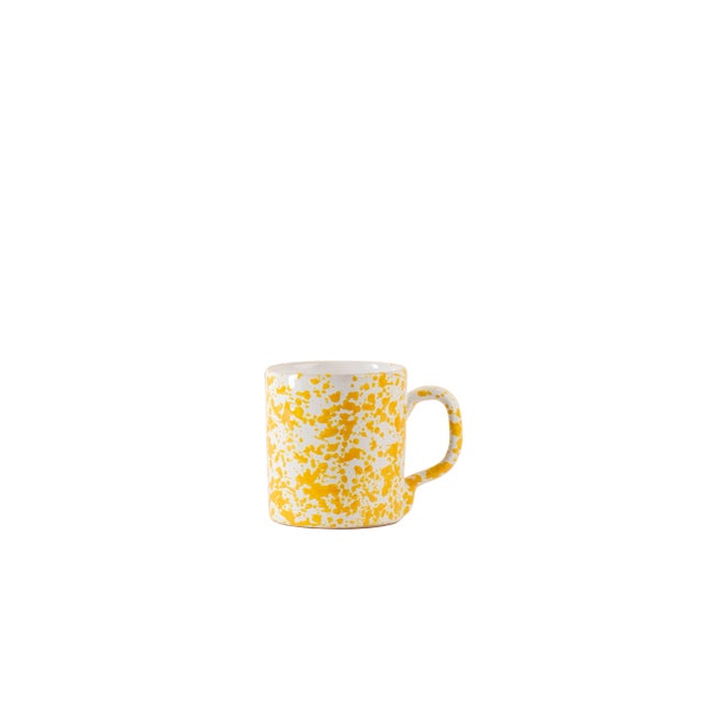 This hand-painted mug is the perfect size and the varying hues of yellow and white in a unique pattern make this a very...