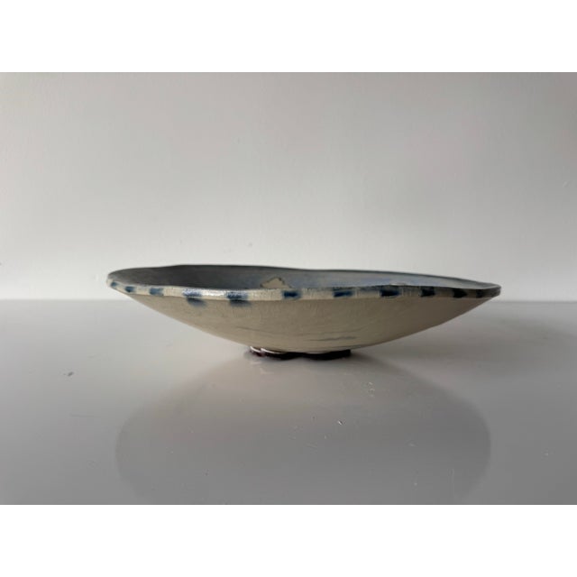 Charming vintage art ceramic bowl by Ketsiland, dating to the 1970s. This whimsical piece features a hand-painted naïve...