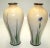 A rare and important pair of fine Japanese Meiji period enamel vases by the renowned imperial artist Namikawa Sosuke....