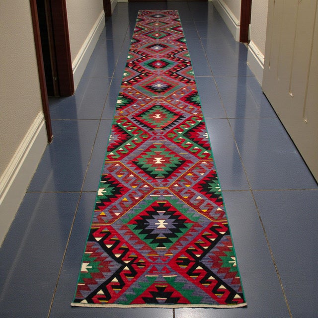 Handwoven in Western Turkey’s historic Oushak region, this striking mid-century kilim runner embodies the deep artisanal...