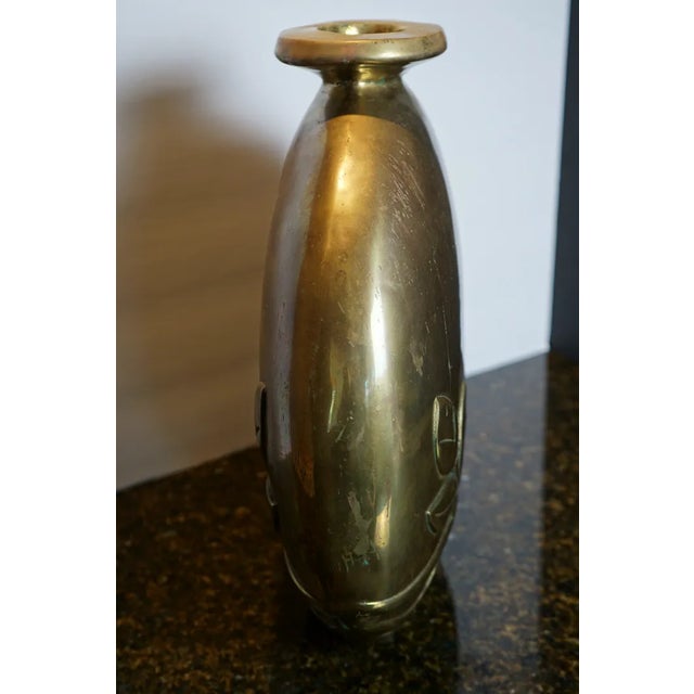 Indulge in the warm glow of this striking Dolbi Cashier brass globe vase, a sculptural treasure from 1980 that radiates...