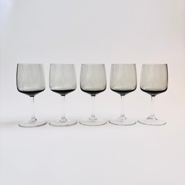A set of 5 mid century wine glasses, made in Germany by Peill & Putzler. Made in the "Cora" pattern, an elegant design...
