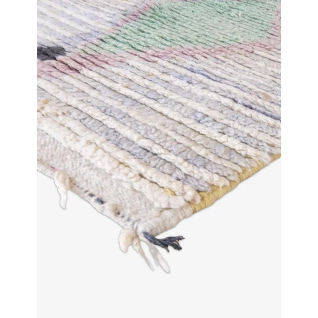 Transform your space with the soft sophistication and artistic elegance of this Abstract Wool Runner Rug—a handwoven...