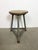 Vintage Industrial factory stool made in former Czechoslovakia during the 1960s It features a wooden seat and a grey iron...