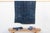 A masterwork of Malian textile heritage featuring deep indigo saturation and symbolic geometric motifs. Originating from...