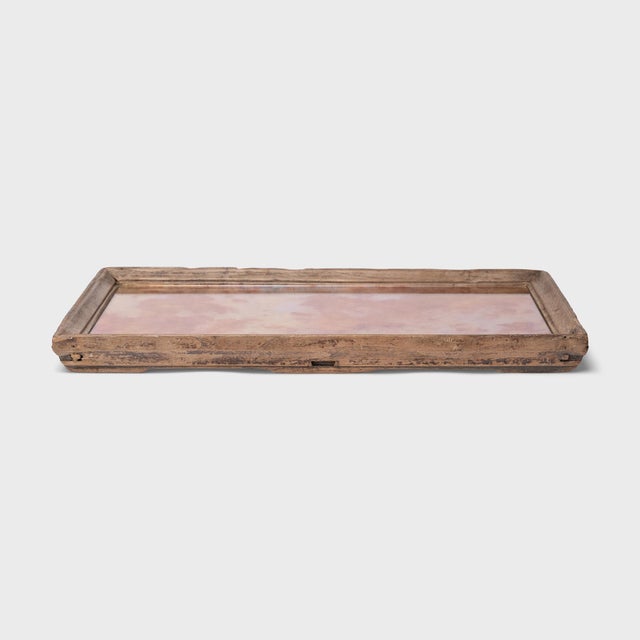 Dovetail joinery and a beveled trim add charming detail to the simple lines of this century-old Chinese tea tray. The...