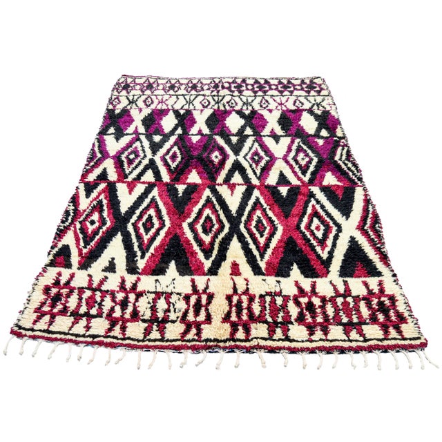 One-of-a-kind hand-knotted Moroccan rug in soft, organic wool featuring an ornate pattern of Berber diamonds and lozenge...