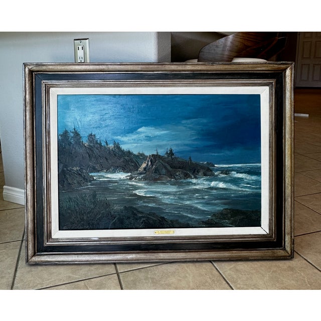 A spectacular and highly dramatic mid-20th century coastal seascape oil painting titled "Moonrise Depoe Bay" by the...