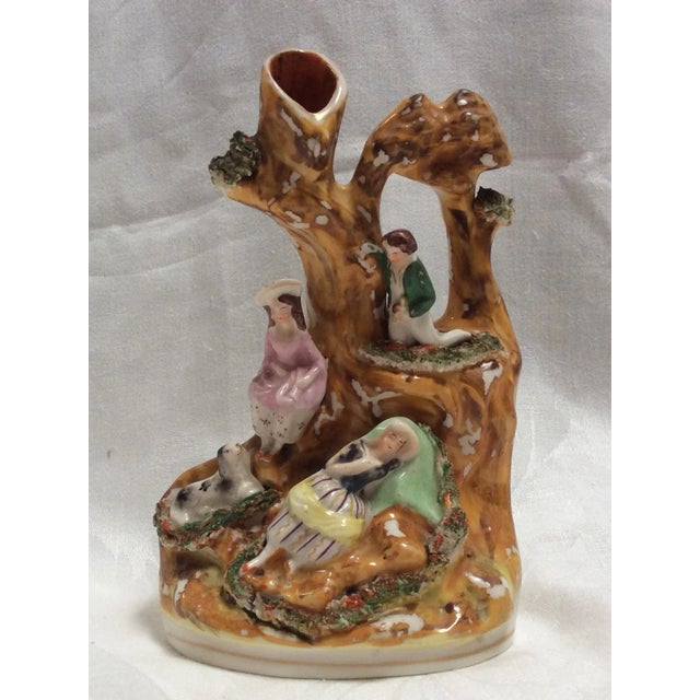 Great little staffordshire spill Vase with figures and animals. This is from the 19th century and more interesting than...