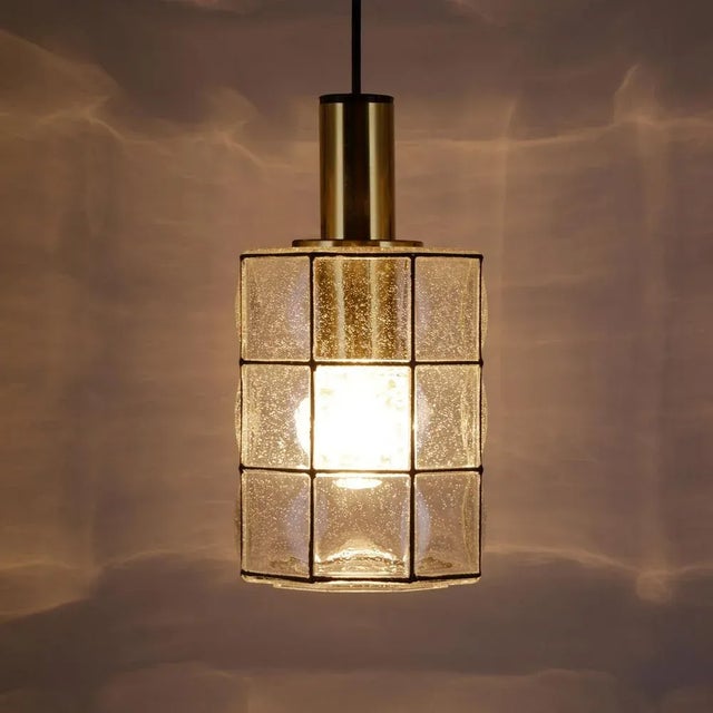 Mid-century modern german pendant lamp from glashuette limburg, from the 1960s. The special octagonal design of the...
