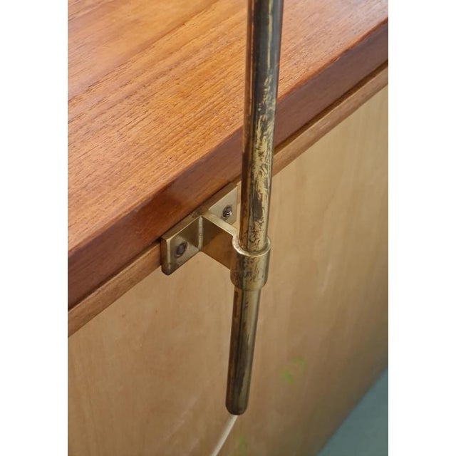 A beautiful and very rare table mounted lamp designed by Paavo Tynell, comissioned by Finnair and manufactured by Taito Oy...
