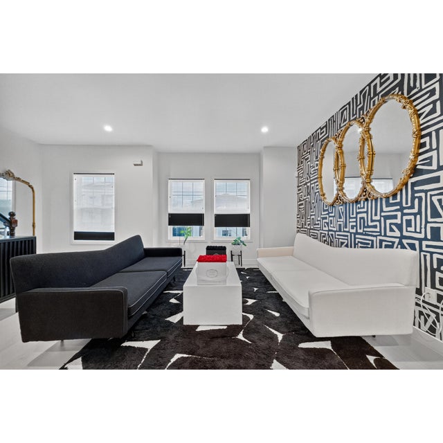 From CB2s bowtie collection this couch is a stunner, and SOLD OUT everywhere. I have both the black and white one for...