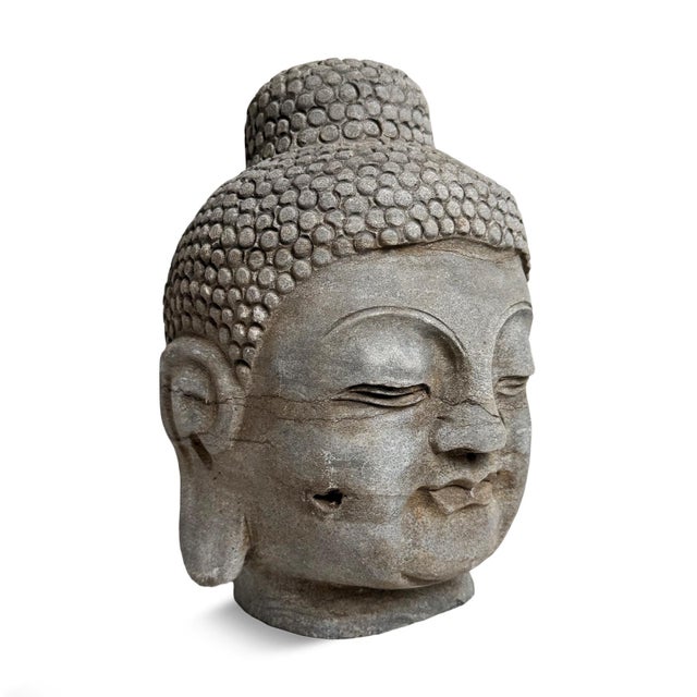 Vintage stone Buddha head small statue from North China. Peaceful expression and signs of age. Wonderful for outdoor or...