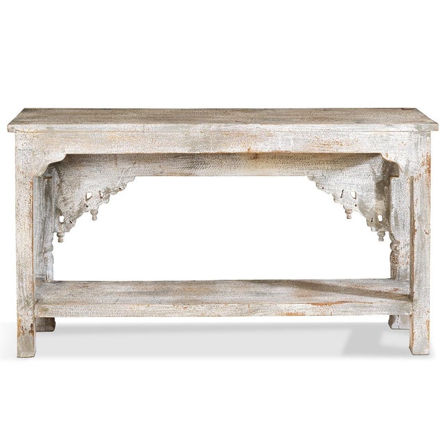 Handcrafted from solid mango wood, this vintage console table showcases authentic Indian woodworking artistry. Intricate...