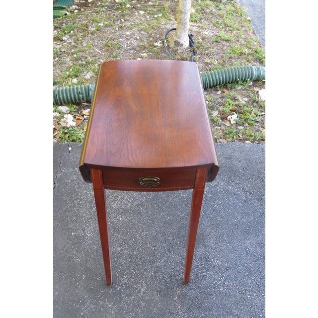 This Drop Leaf Table is made out of wood, solid wood, mahogany, and veneer. The Table has a Traditional style and design,...