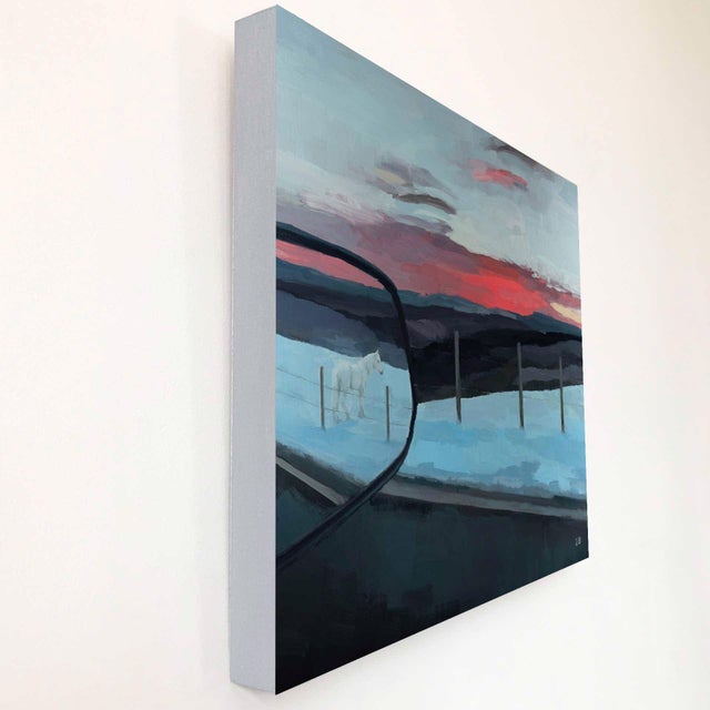 In "And Belonged to Otherwise Memory," a serene winter landscape unfolds, featuring a solitary white horse standing...