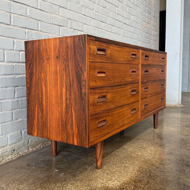 This is one of two matching rosewood Hundevad dressers we currently have in the shop. They have been fully stripped and...