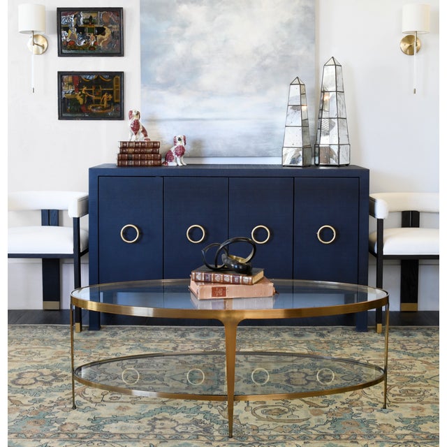 New special order item. Not vintage. Meet the Brando—your living room's new best friend! This charming oval coffee table...