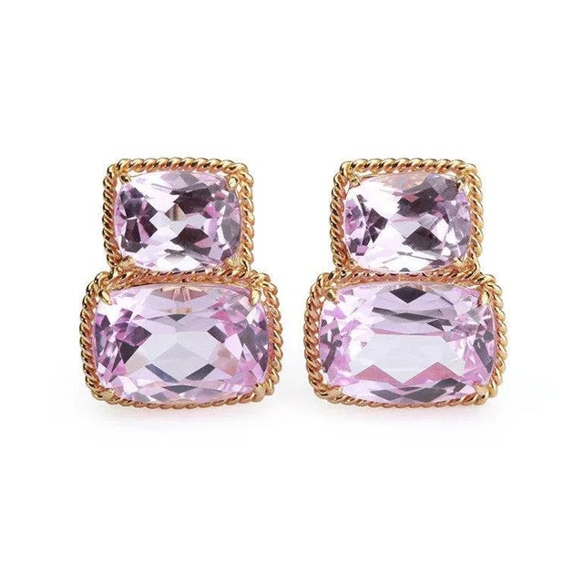 Christina Addison Elegant 18kt Yellow Gold Rope Twist Border two stone Earring with faceted Pink Topaz. This is a classic...