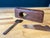 Antique handcrafted wood plane 9.5 inches long with a forged steel cutting blade.