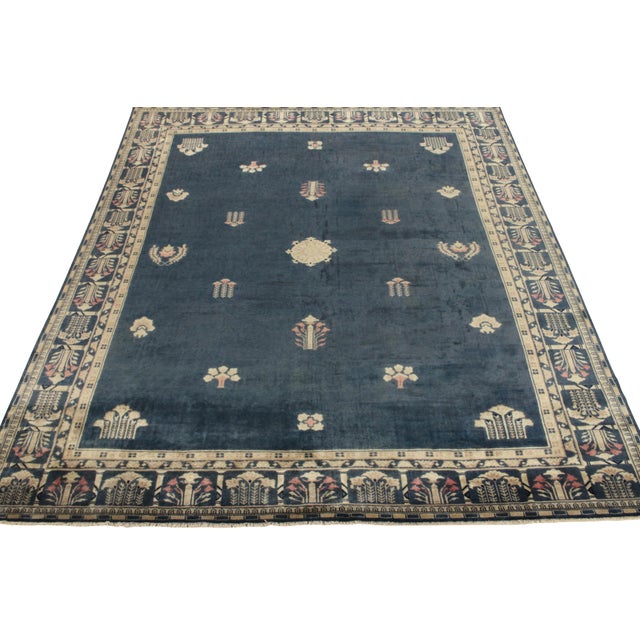An 8x10 vintage rug exemplifying 1920s Chinese Art Deco sensibilities, featuring intricate floral patterns on field &...