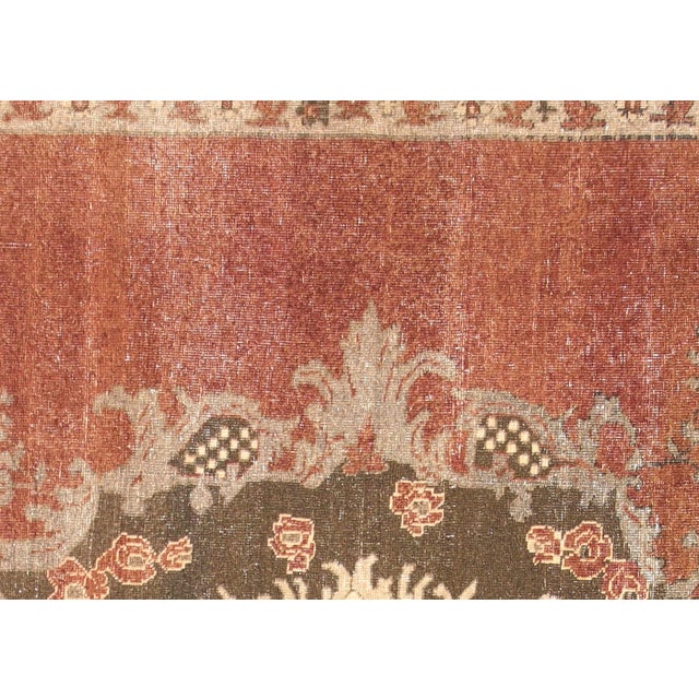 This beautiful vintage Turkish Oushak Rug is hand-knotted with 100% wool on a wool foundation to provide a soft, warm...