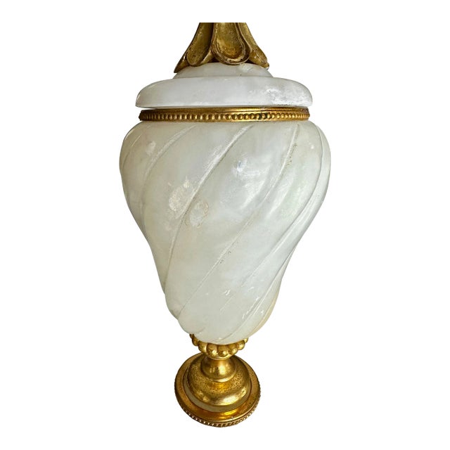 Pair of French alabaster neo-classic style table lamps with gilt bronze or brass adornments. Newly wired with new 3 way...