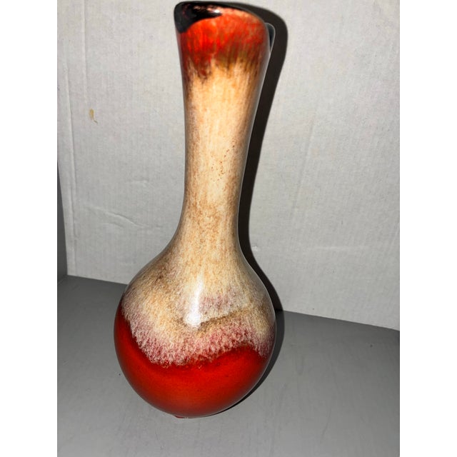 An exceptional mid-century statement piece, this Royal Haeger art pottery vase features a dramatic, elongated silhouette...