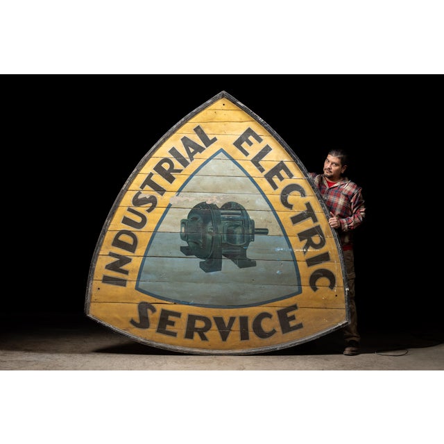 Antique wooden industrial repair shop sign. This extravagant sign was once used to advertise industrial electric repair,...