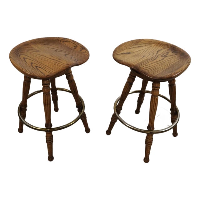 1970’s Solid Oak & Brass Tractor Swivel Counter Stools - A Pair For Sale