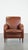 This luxurious cognac-colored sheep leather armchair with round shapes and a unique design. This fantastic sheep leather...
