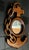 This fun piece is a hand-carved wooden anchor and chain mirror with a nautical folk art aesthetic.