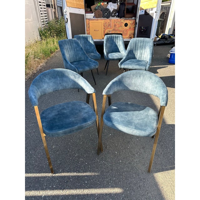 I have loved those beautiful denim colored blue and gold dining chairs. They have been stylish and very comfortable chairs...