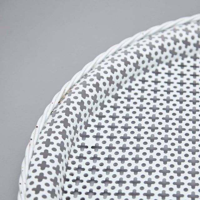 Enameled metal plate designed by Mathieu Matégot. Manufactured by Atelier Matégot (France), circa 1950. Lacquered...