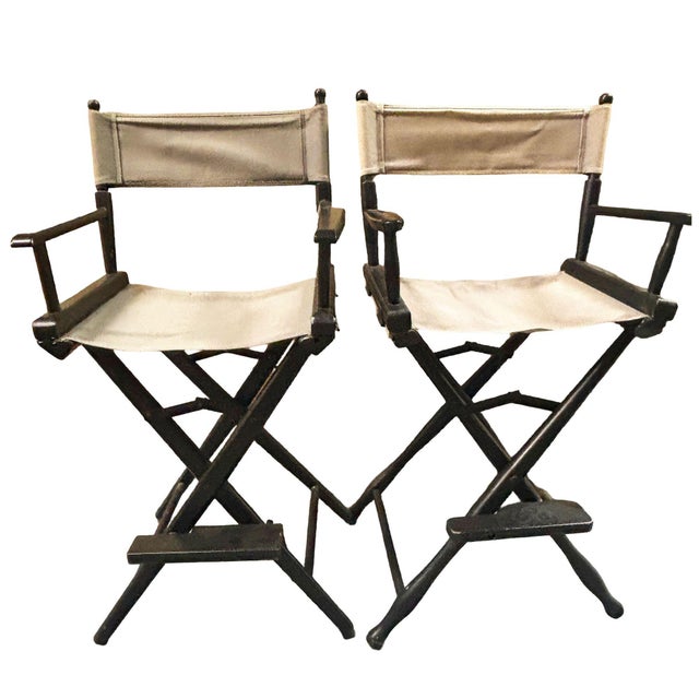Bring Hollywood's most iconic seating legacy into your space with this pair of classic counter-height director's chairs...