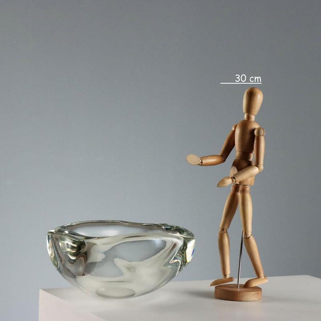 Solid glass ashtray made by Barbini. Signature under the base. This piece is attributed to the mentioned designer/maker....