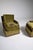 A refined pair of Danish armchairs reflecting early Scandinavian modern design, where simplicity and comfort take...