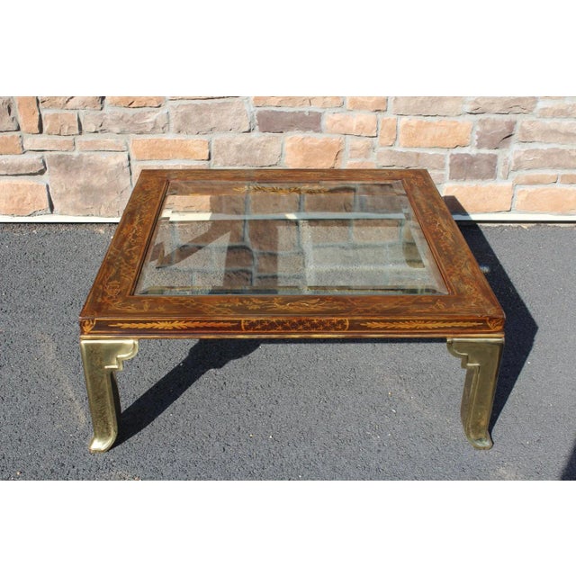 Mastercraft in Grand Rapids, Michigan, produced some amazing pieces, and this coffee table is one of them! The brass legs...