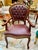Add timeless sophistication to your interior with this elegant French-style armchair. Crafted from solid wood and...
