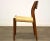 A mid century modern teak model 71 dining chair by Arne Hovmand Olsen with a paper cord seat. Seat height is 17”....